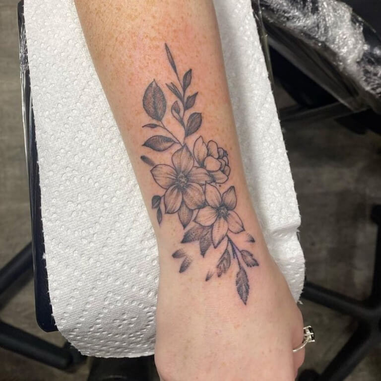 Feminine tattoo done at Iron Palm Tattoo in Atlanta, Georgia. Walk-ins welcome. Call 404-973-7828 or stop by for a free consultation.