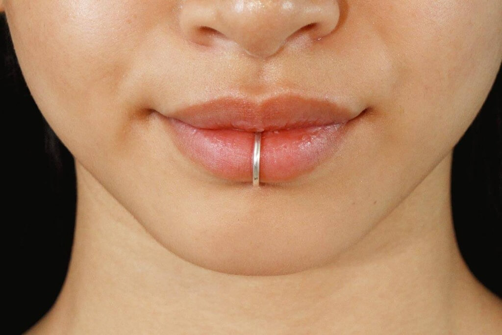 Lip piercings $85.00 & include jewelry at Iron Palm Tattoos & body Piercing in downtown Atlanta, Georgia. Walk-ins accepted. Call 404-973-7828