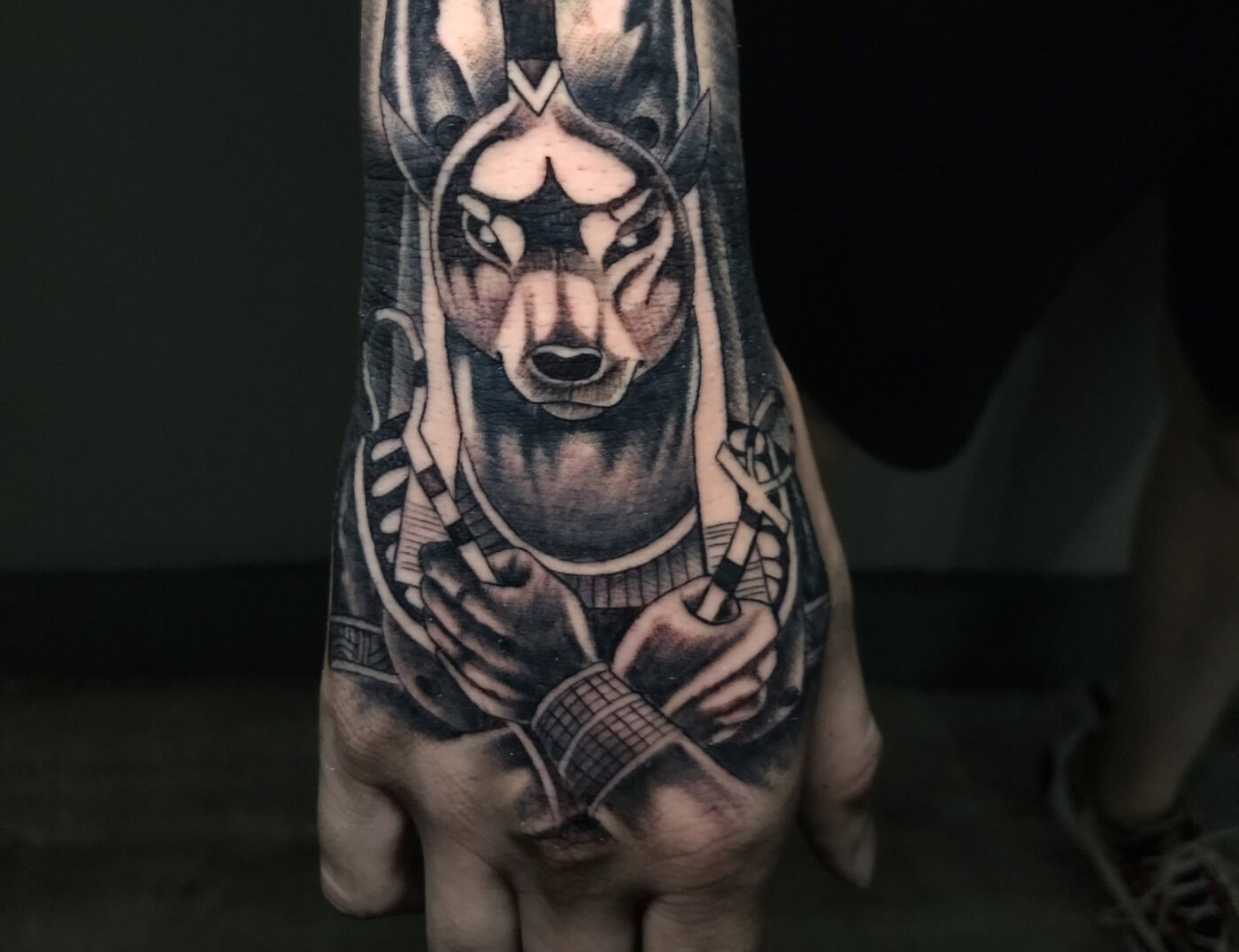 Anubis is an Egyptian God of the Dead,. This black & grey portrait tattoo was created by J.R. Outlaw of Iron Palm Tattoos & Body Piercing. We're open late night for tattoos. Call 404-973-7828 or stop by for a free consultation.