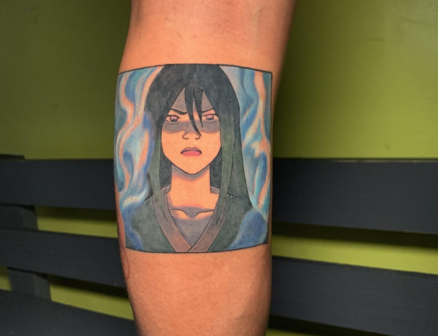 Azula with blue fire Anime Portrait tattoo by J.R. Outlaw of Iron Palm Tattoos & Body Piercing. Inspired by the world of 'Avatar' from "The Last Airbender.' Call 404-973-7828 or stop by for a free consultation. Walk-Ins welcome