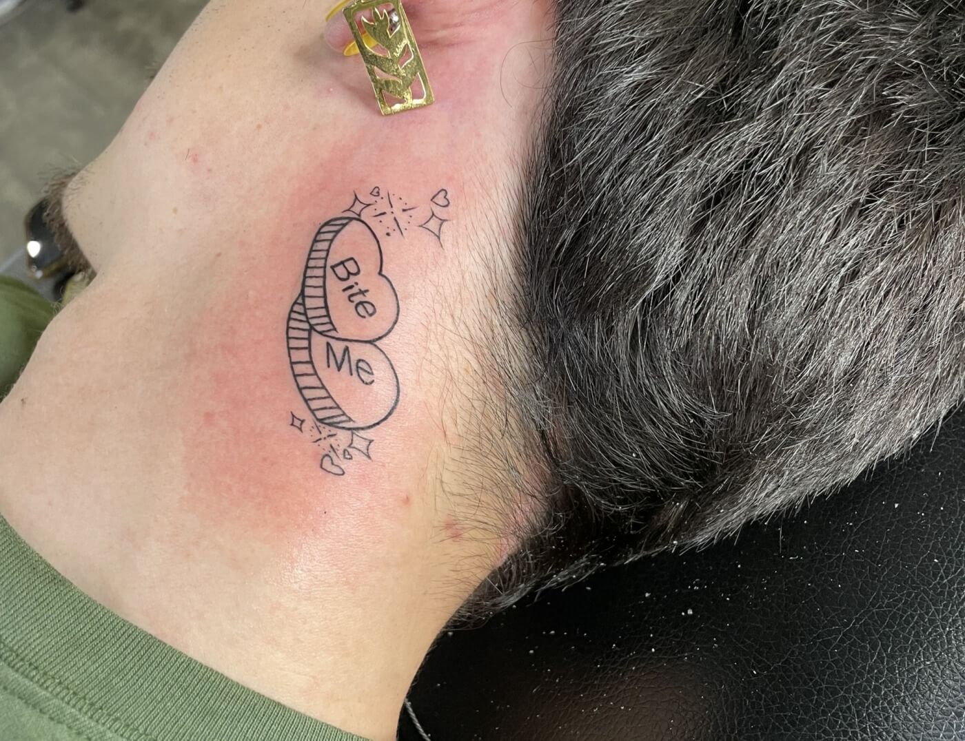 Candy hearts script tattoo by Paper Airplane Jane of Iron Palm Tattoos in downtown Atlanta, GA. Jane is a female tattooer. Call 404-973-7828 or stop by for a free consultation with a body artist. Walk Ins are welcome.