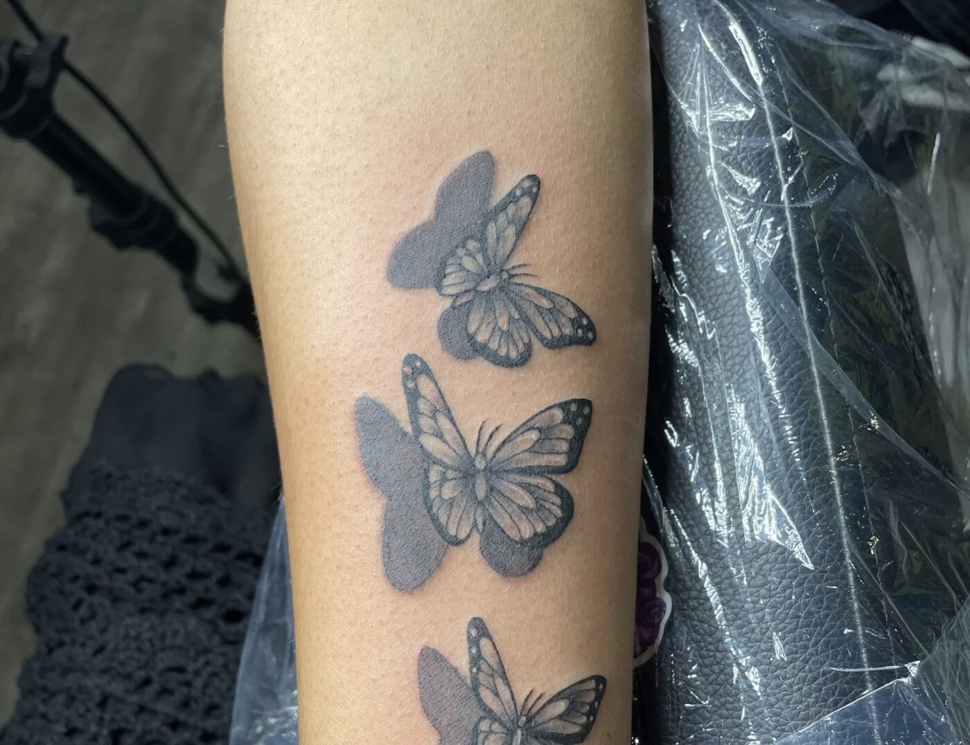 Butterfly tattoo by Paper Airplane Jane of Iron Palm Tattoos. Walk-Ins are accepted. Call 404-973-7828 or stop by for a free consultation.