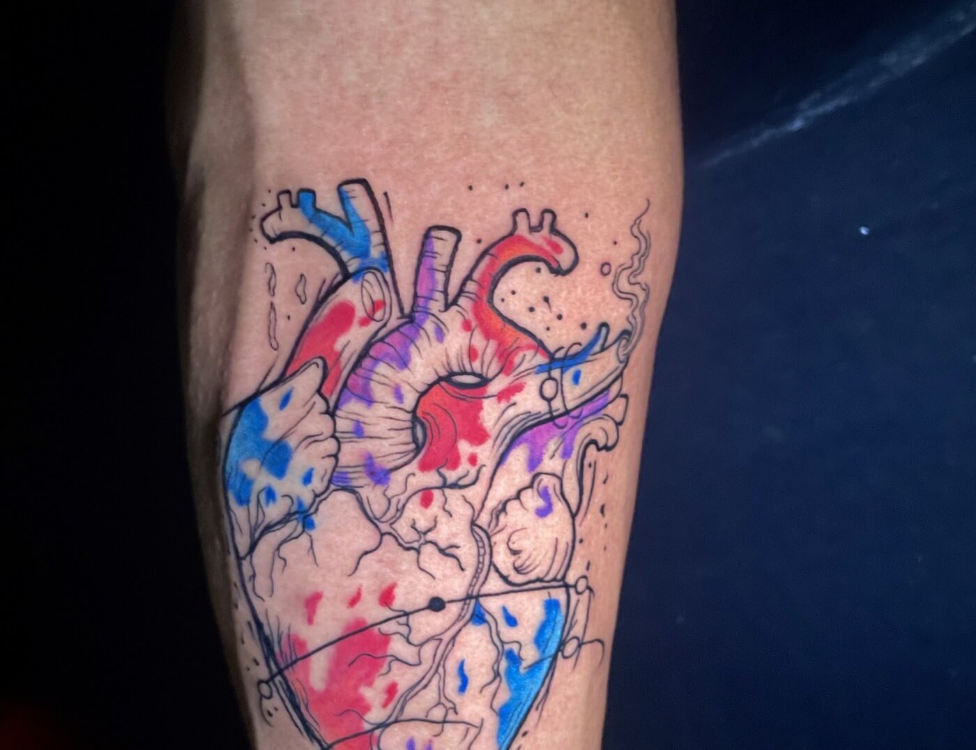 Fine line human heart tattoo with a touch of water colors by Lyric TheArtist at Iron Palm in downtown Atlanta. What do you think? Let us know in the comments. We're open late night until 2AM in ATL's Castleberry Hill district not far from the greyhound bus station and the infamous Magic City. Call 404-973-7828 or stop by for a free consultation. Walk-Ins are welcome. #hearttattoo #art #atlink #atlantatattoo #atlantaink #tattoolife #ironpalmtattoos #tattoostudio #atlantatatt #blackowned #colortattoo #atlantatattooshop #tattooideas #tattoo #finelinetattoo #georgiatattoo #inkedlife #atlantatattooartist #atlien #tattooartist #atlantaart #downtownatlanta #tattoodesign #atlantaartist #watercolortattoo #georgiatattooartist #coloraplashtattoo