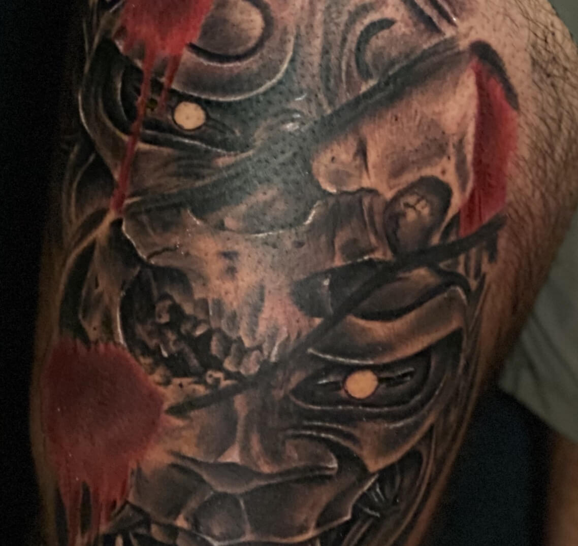 Oni Mask & Skull by DB.Wyte, A Tattoo Artist In Atlanta at Iron Palm Tattoos. Call 404-973-7828 or stop by for free consultation. Walk-Ins are welcome.