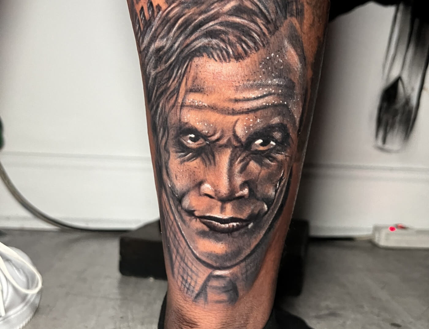 Portrait tattoo of Heath Ledger as The Joker by body artist DB. Wyte, a tattooer at Iron Palm Tattoos in the Castleberry Art district of Atlanta, GA. Call 404-973-7828 or stop by for a free consultation to book DB. Wyte.