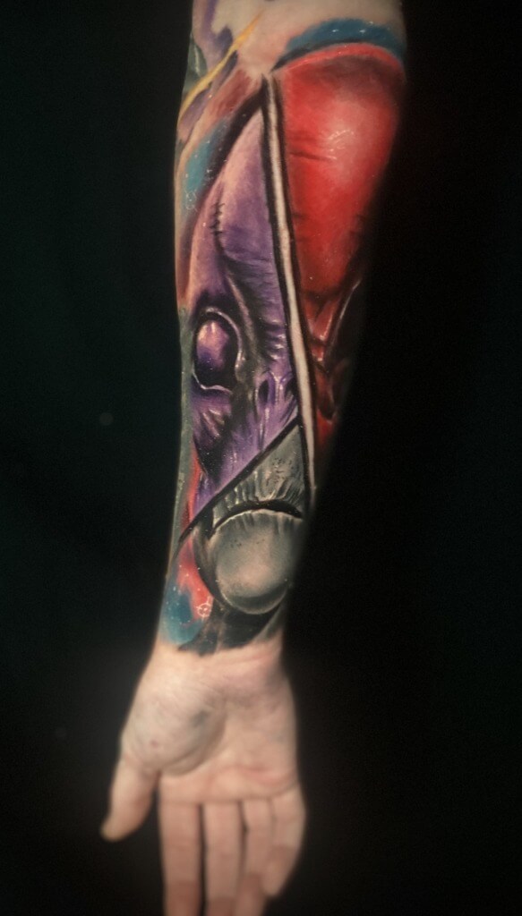 Alien portrait tattoo by DB. Wyte of Iron Palm Tattoos & Body Piercing. Call 404-973-7828 or stop by for a free consultation. Walk-INs welcome.