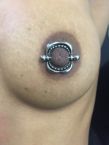 Bear Trap Nipple Piercing Installed at Iron Palm Tattoos in Atlanta. Call 404-974-7828 or stop by for a free consultation with an Iron Palm Body Artist. Walk-Ins are welcome!