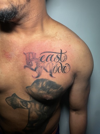 Beast Mode Lettering Script Tattoo With Black & Gray Gradient by Lyric TheArtist at Iron Palm Tattoos in Atlanta Georgia. We're open late night most nights until 2AM. Call 404-973-7828 or stop by for a free consultation with Lyric.