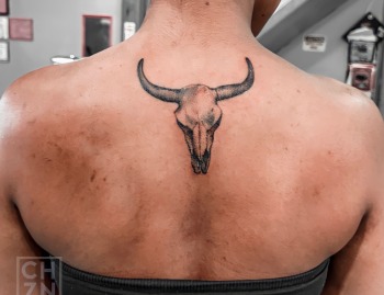 Bull Skull Tattoo By Choze At Iron Palm Tattoos In Downtown Atlanta Georgia. These animal skull tattoos represent strength, nature, mortality, rebellion, and the wild west culture. Call 404-974-7828 or stop by for a free consultation with a Iron Palm body artist. Walk Ins are welcome.