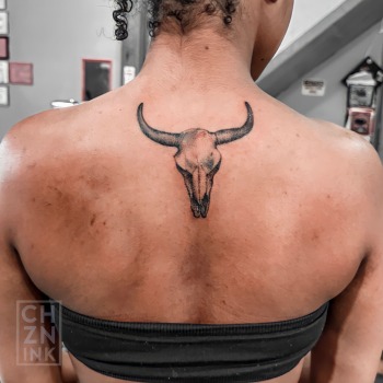Bull Skull Tattoo By Choze At Iron Palm Tattoos In Downtown Atlanta Georgia. These animal skull tattoos represent strength, nature, mortality, rebellion, and the wild west culture. Call 404-974-7828 or stop by for a free consultation with a Iron Palm body artist. Walk Ins are welcome.
