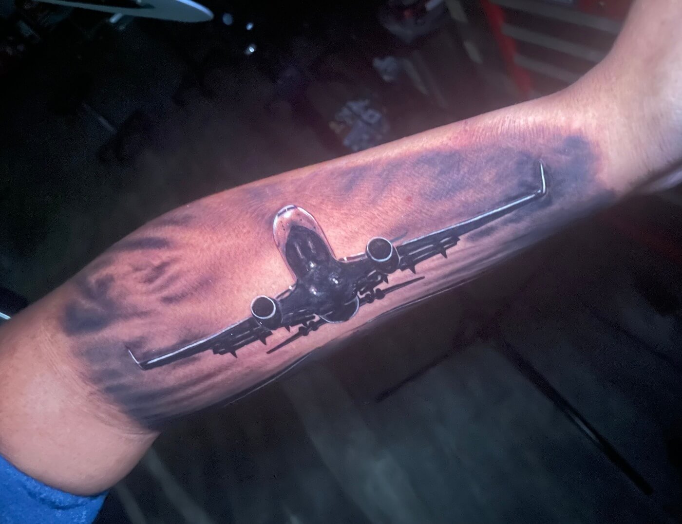 Commercial Jet Airline Colored Photo-realistic Tattoo by tattooist Terrance Sawyer At Iron Palm Tattoos In Downtown Atlanta. Call 404-973-7828 or stop by for a free consultation.