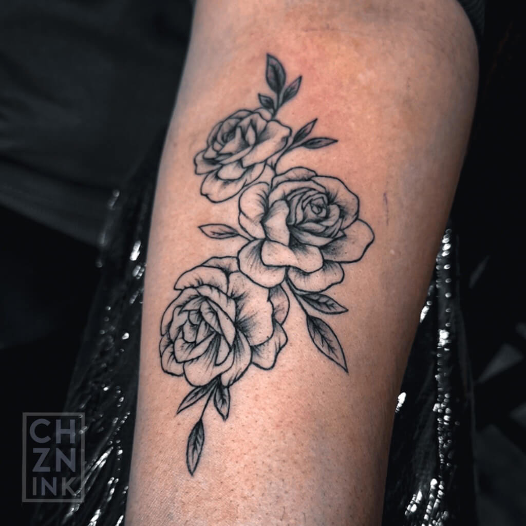 "Rose In Bloom" Flower Tattoo By Choze At Iron Palm Tattoos In South Downtown Atlanta Georgia. Bloomed rose tattoos normally symbolize positive meanings such as beauty, love:, growth, transformation, hope, or renewal. Call 404-973-7828 or stop by for free consultation with an Iron Palm Tattoo artist. Walk ins are welcome.