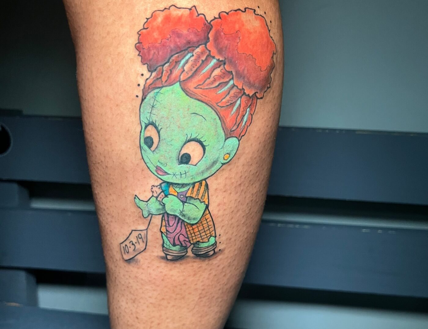 Baby Sally "Nightmare Before Christmas" Tattoo By Funk Tha World At Iron Palm Tattoos. This tattoo was requested by and inked for @_mi.ch.ele_ as a gift for her daughter. Call 404-973-7828 or stop by for a free consultation with Funk on your next tattoo. Walk Ins are welcome.