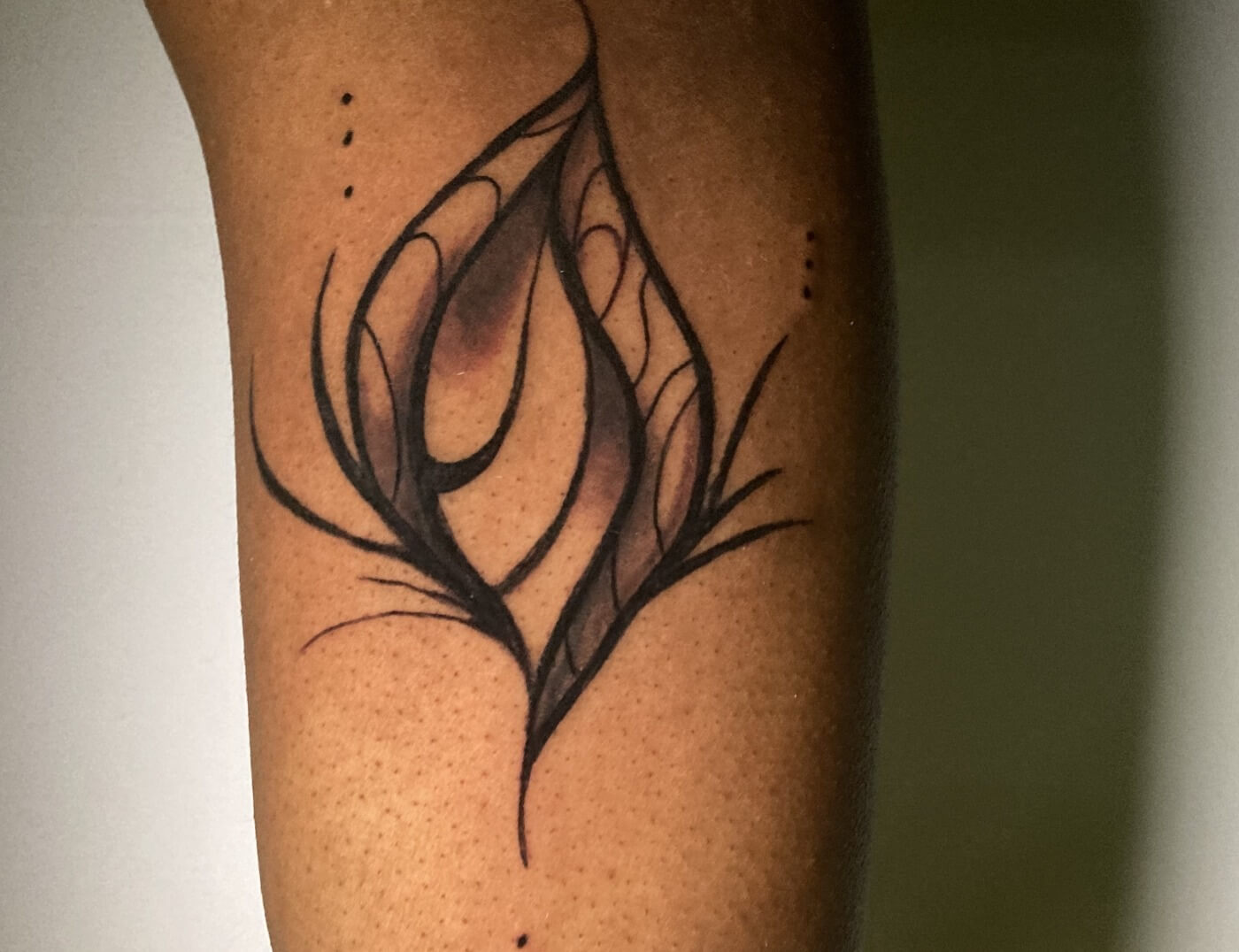 'Budding Seed' Fine Line Minimalist Tattoo By Funk The World At Iron Palm Tattoos In Atlanta, GA. Funk drew this image in his sketchbook to symbolize his growth as an artist. One of his clients, Asyah Payton, decided to purchase the flash and ink it into her life. We're open late night until 2AM. Call 404-973-7828 or stop by for a free consultation with Funk. Walk Ins are welcome.