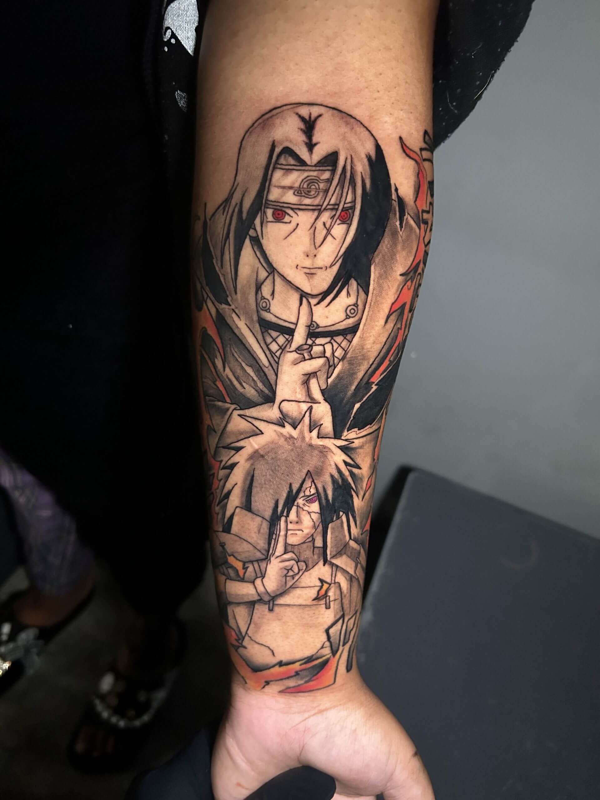 Full Sleeve Naruto & Ju-Jitsu Kaisen anime manga tattoo by Lyric TheArtist at Iron Palm Tattoos In downtown Atlanta Georgia. Naruto and Ju-Jitsu Kaisen are both famously popular Javanese animations. Ju-Jitsu Kaisen is a Japanese manga series written and illustrated by Gege Akutami. The series follows the story of Yuji Itadori, a high school student who becomes a Jujutsu Sorcerer Naruto is a Japanese manga series written and illustrated by Masashi Kishimoto. The series follows the story of Naruto Uzumaki, a young ninja who dreams of becoming the most powerful and respected ninja in his village. Lyric's designs have become a city favorite for Anime tattoos in Atlanta. Call 404-973-7828 or stop by for a free consultation with Lyric. We're open late night til 2AM and walk-ins are welcome.