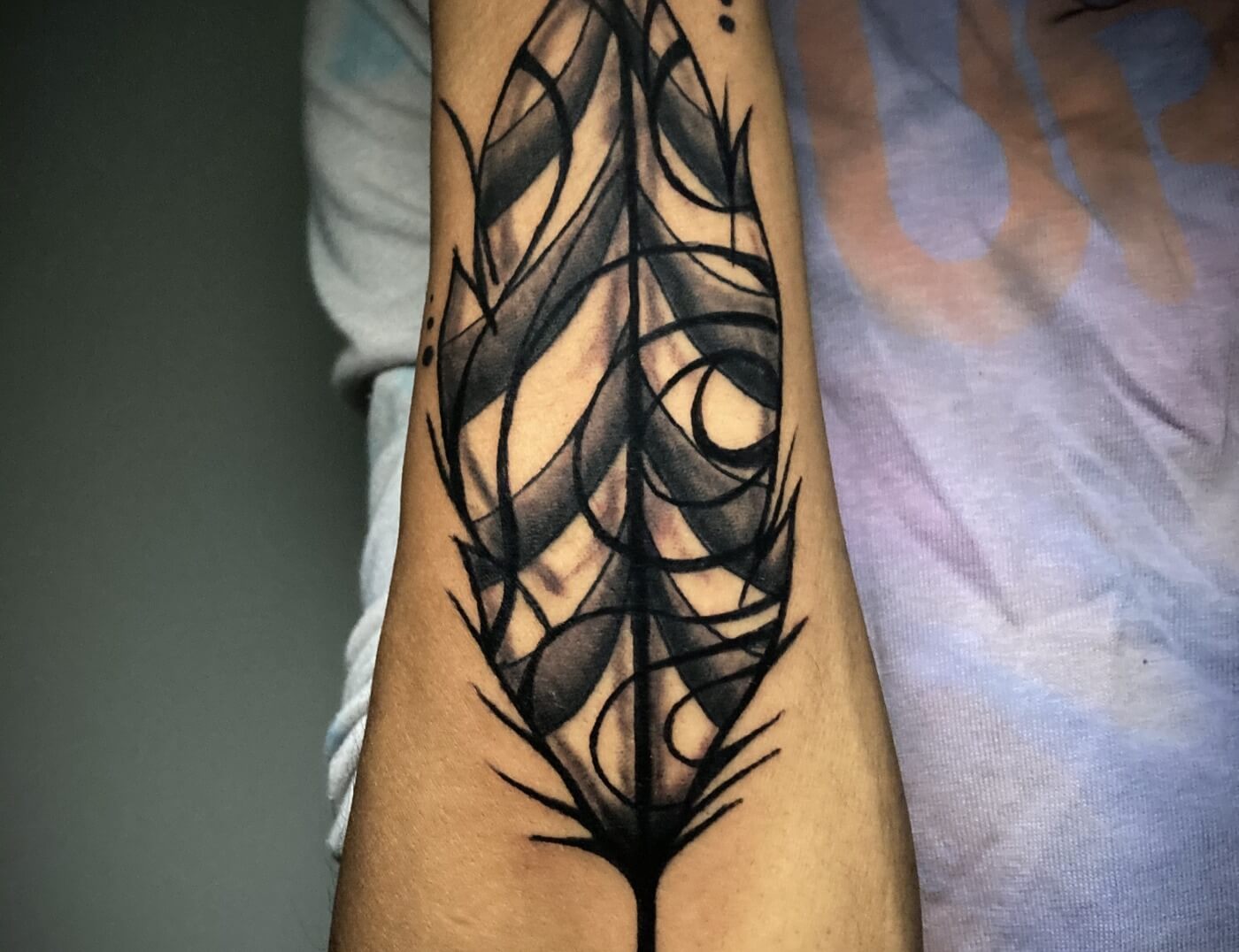 'Funky Feather' Tattoo in Black And Grey By Funk Tha World At Iron Palm Tattoos In Atlanta. Call 404-973-7828 or stop by for a free consultation with Funk. Walk Ins are welcome.