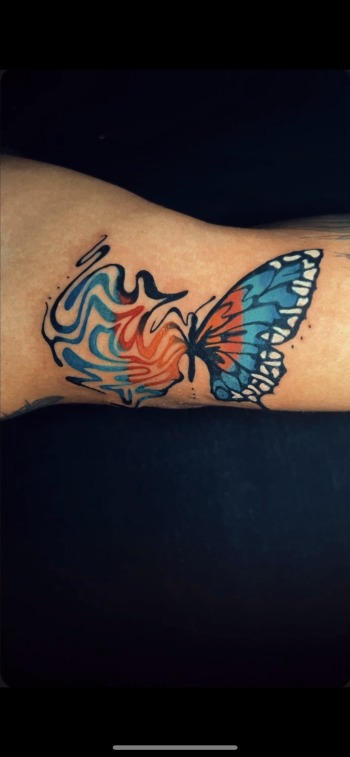 Funky Fine Line Butterfly Tattoo With Color By Funk Tha World At Iron Palm Tattoos. Call 404-973-7828 or stop by for a free consultation with Funk. Walk ins are welcome.