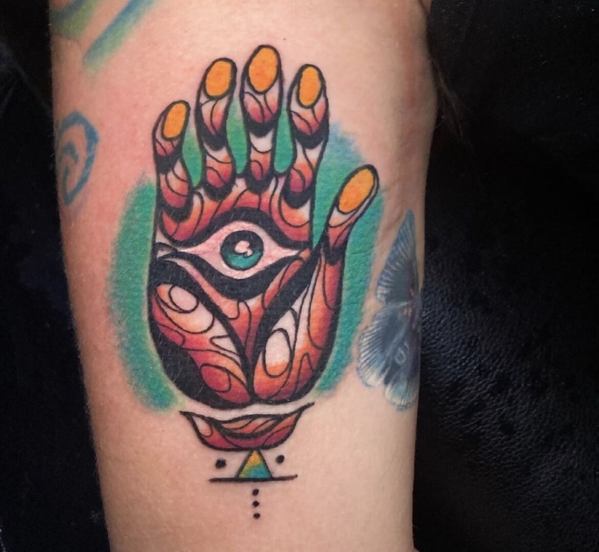 Hamsa Tribal Tattoo By Funk Tha World At Iron Palm Tattoos In Atlanta Georgia. Hamsa Tattoos symbolize the 'Hand of God' in multiple religions but also symbolize fertility as well. Call 404-973-7828 or stop by for a free consultation with Funk. Walk Ins are welcome.