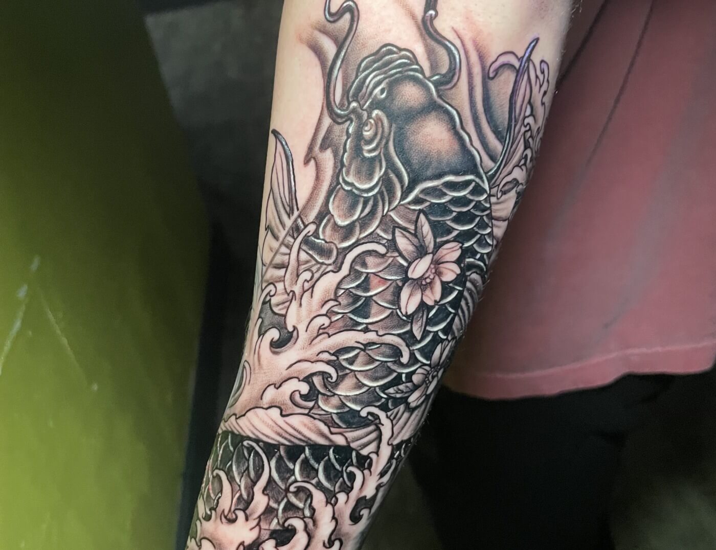 Haku Dragon with Cherry Blossom Black & Gray Sleeve by Terrance Sawyer at Iron Palm Tattoos In Atlanta. Haku & Cherry blossom tattoos are popular in Japanese culture and has its roots in the Samurai love of nature. Call 404-973-7828 or stop by for a free consultation. Walk Ins are welcome.