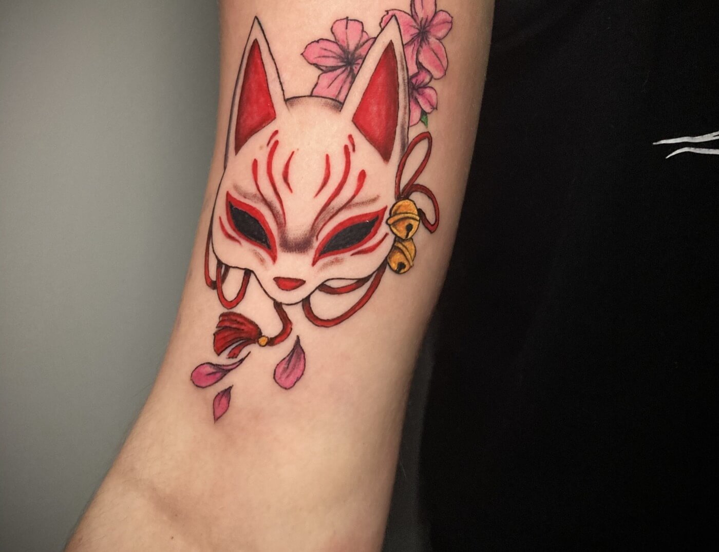 "Kitsune No Yomeiri," Kitsune Fox Mask Tattoo by Funk Tha World at Iron Palm Tattoos in downtown Atlanta, GA. Kitsune no yomeiri, or the fox's wedding, is a popular folktale in Japan that tells the story of a fox who transforms into a beautiful woman and marries a human. The story is often seen as a metaphor for the transformative power of love and the idea that true love can transcend societal norms and barriers. We're open late night until 2AM and accept walk ins. Call 404-973-7828 to schedule a free consultation with Funk.