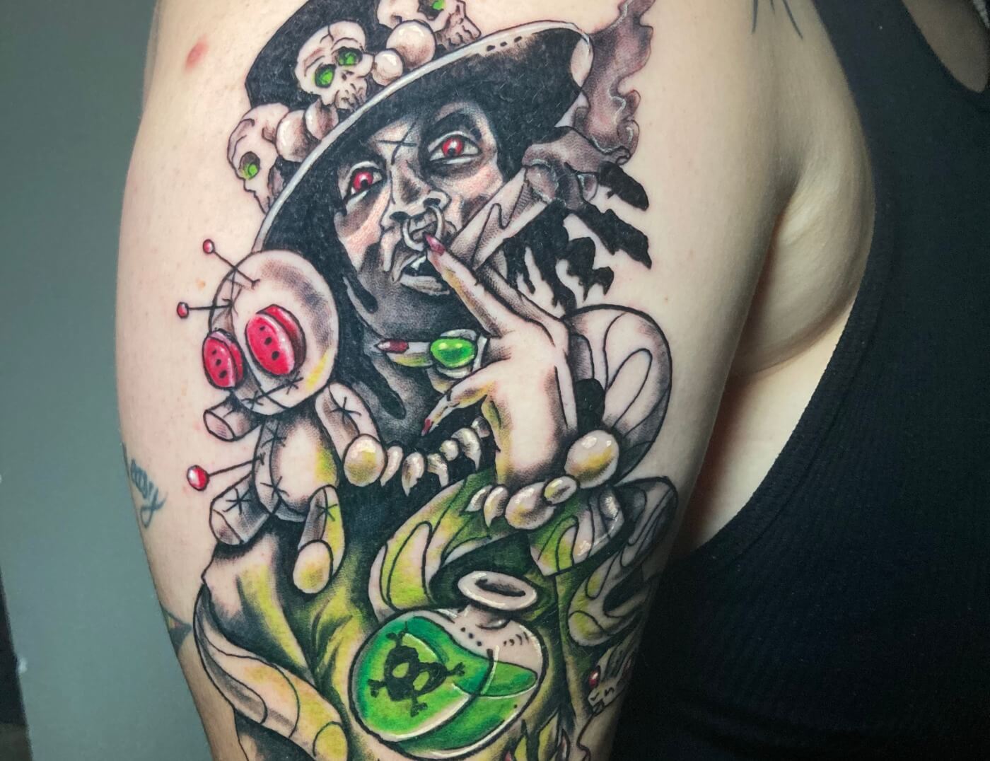 Papa Legba Tattoo By Funk Tha World At Iron Palm Tattoos. A prominent figure in Hattian and Louisiana Voodoo, Papa Legba is considered to be a gatekeeper between the living and spiritual realms...And one of the scariest figures in the voodoo and Cajun culture. Call 404-973-7828 or stop by for a free consultation. Walk Ins are welcome.