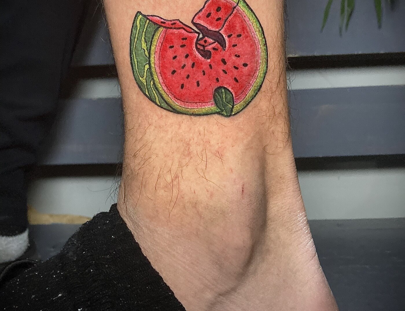 Wu-Tang Watermelon "Wutamelon" Tattoo By Funk Tha World At Iron Palm Tattoos in downtown Atlanta near five points. Beautifully detailed and colored. We're open late night until 2AM. Call 404-973-7828 or stop by for a free consultation with Funk. Walk Ins are welcome.