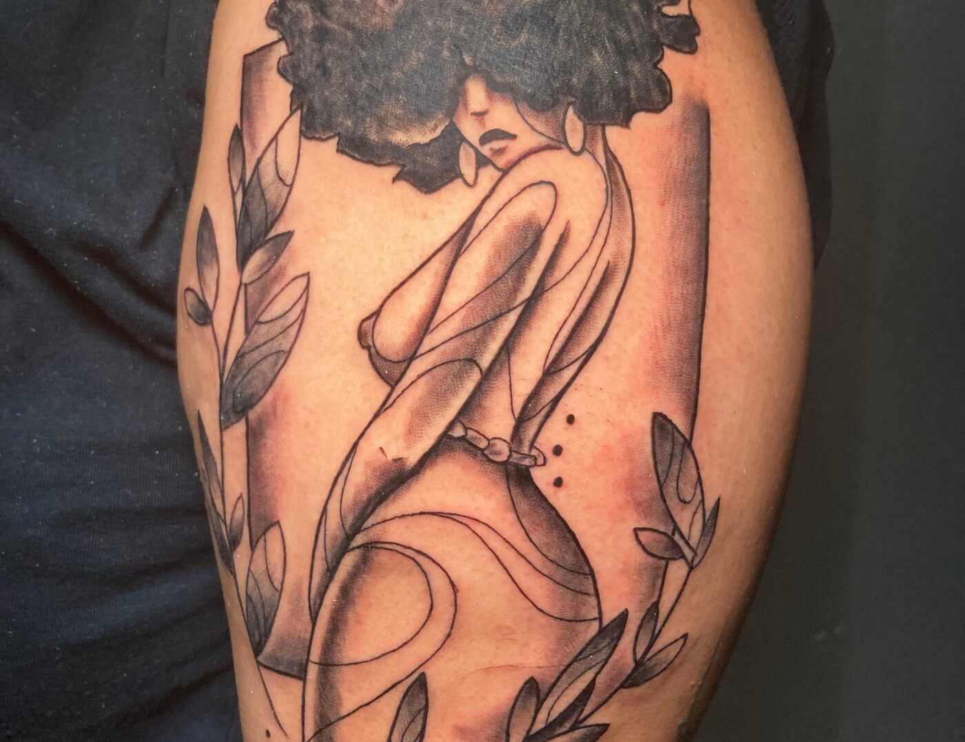 Funky Afro-American Woman In Black & Grey By Funk Tha World. We're open late night until 2AM. Call 404-973-7828 or stop by for a free consultation with Funk.