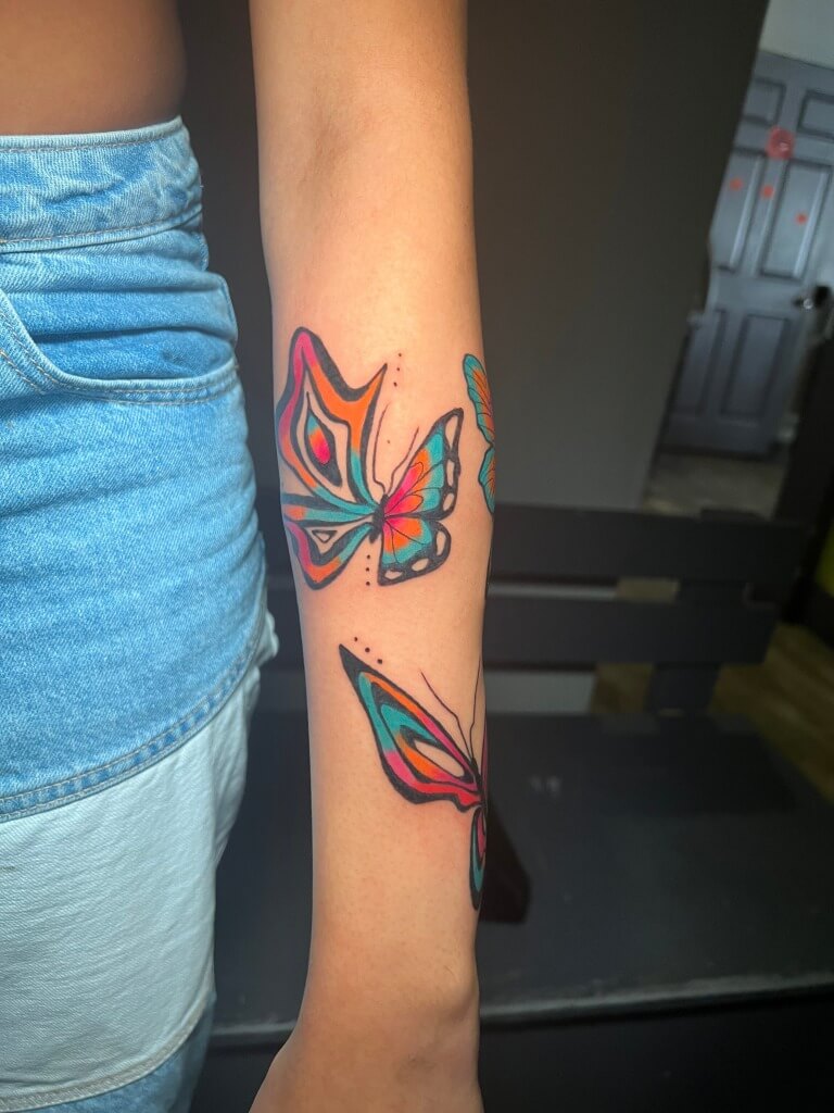 Funky Color Butterfly Tattoo By Funk Tha World At Iron Palm Tattoos In Atlanta, Georgia. Inked for @its_kaiyaa at her request. We're open late night until 2AM. Call 404-973-7828 or stop by for a free consultation with Funk or another Iron Palm Body Artist.