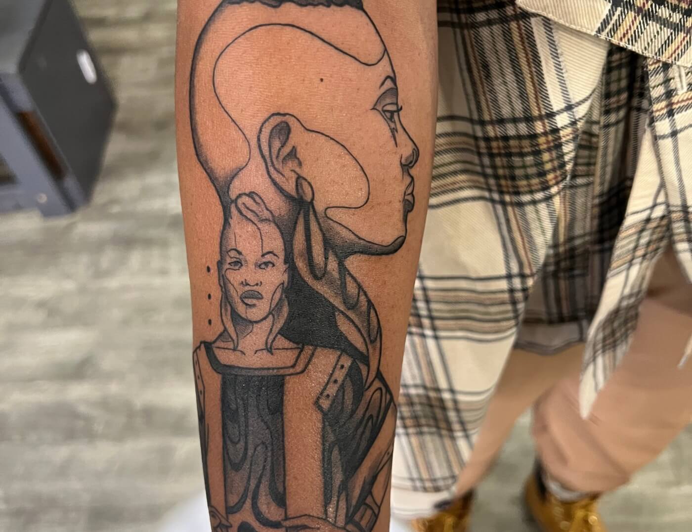 "Judah" Memorial Portrait Tattoo In Black & Grey By Funk Tha World At Iron Palm Tattoos In Atlanta Georgia. This piece was made especially to keep her sister close to her always. We're open late night until 2AM. Call 404-973-7828 or stop by for a free consultation. Walk Ins are welcome.