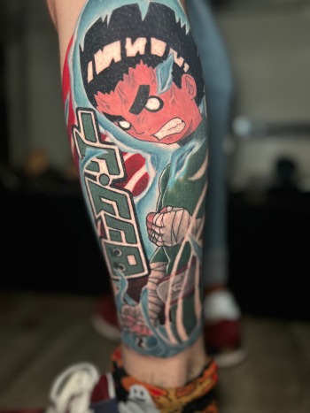 Rock Lee Naruto Anime Manga Color Tattoo By DB Wyte At Iron Palm Tattoos In downtown Atlanta, Georgia. Rock Lee is a character from the Naruto anime and manga series. He is a skilled ninja from the village of Konoha whom specializes in taijutsu. Taijustsu is the art of hand-to-hand combat. Unlike many other ninja characters in the animation series Rock Lee cannot use ninjutsu, genjutsu, or magic and relies solely on his physical abilities to fight. Lee is known for his determination, hard work, and perseverance, as he has trained tirelessly to become a skilled ninja despite his initial lack of talent in other areas. He is often seen wearing a green jumpsuit and leg weights, which he wears to train his leg muscles. We're open late night until 2AM. Call 404-973-7828 or stop by for a free consultation. Walk ins are welcome.