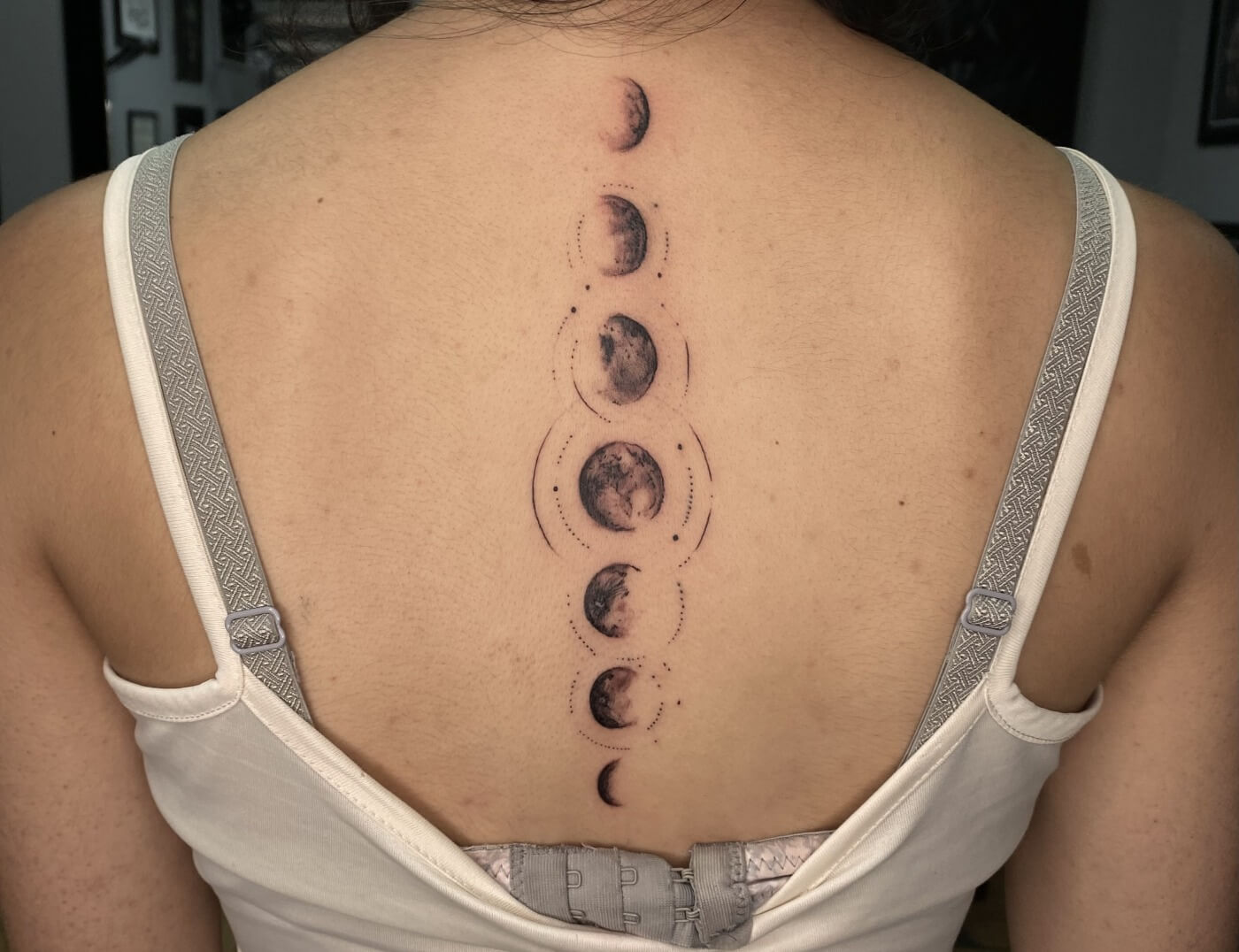 'Moon Phases' Black & Grey Tattoo by Rene Cristobal, A guest Artist At Iron Palm Tattoos. Rene comes to Atlanta from Vision Tattoo Studio in Concepcion, Chile. The moon is a symbol of change, cycles, and transformation. The continuous transformation from new moon to full moon and back again represents the continuous cycles of life. People get moon phase tattoos as reminder of the ever-changing nature of existence. We're open until 2AM most nights. Call 404-973-7828 or stop by for a free consultation. Walk ins are welcome.