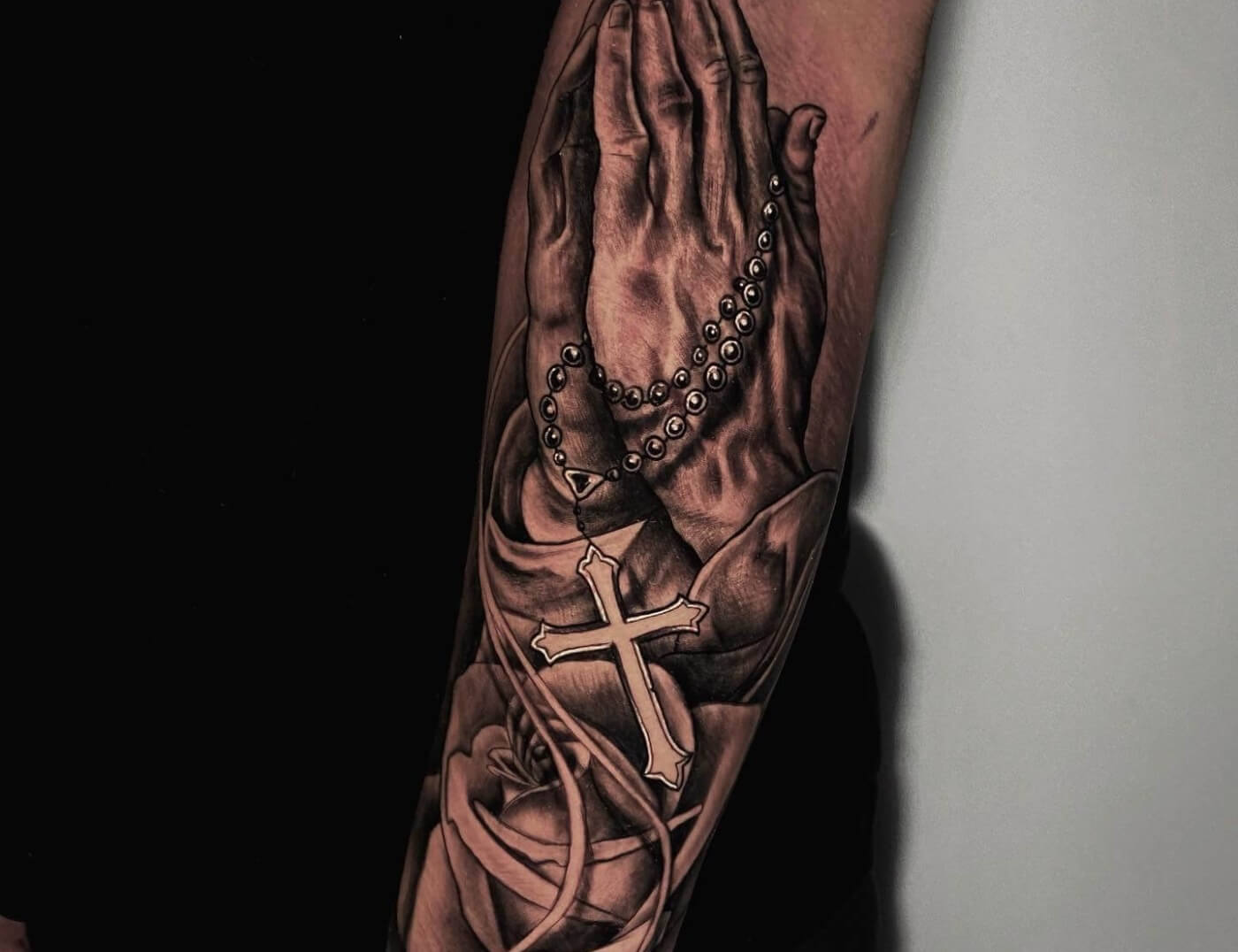 Praying Hands & Rosary Beads Tattoo by Rene Cristobal, a guest artist at Iron Palm Tattoos in Atlanta, GA. Rene comes to Atlanta from Concepcion Chile. Rene is available for booking Sept 11th - 18th, 2023 at Iron Palm. Call 404-973-7828 or stop by for a free consultation. Walk ins are welcome.