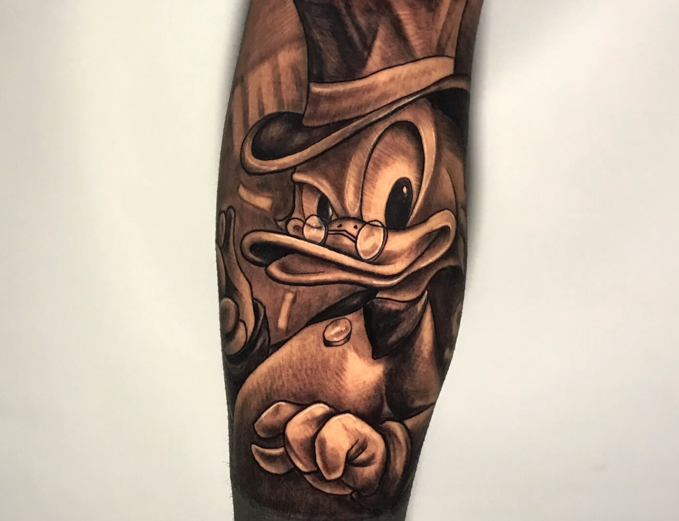 Scrooge McDuck" Black And Grey Tattoo By Rene Cristobal - Iron Palm Tattoos & Body Piercing