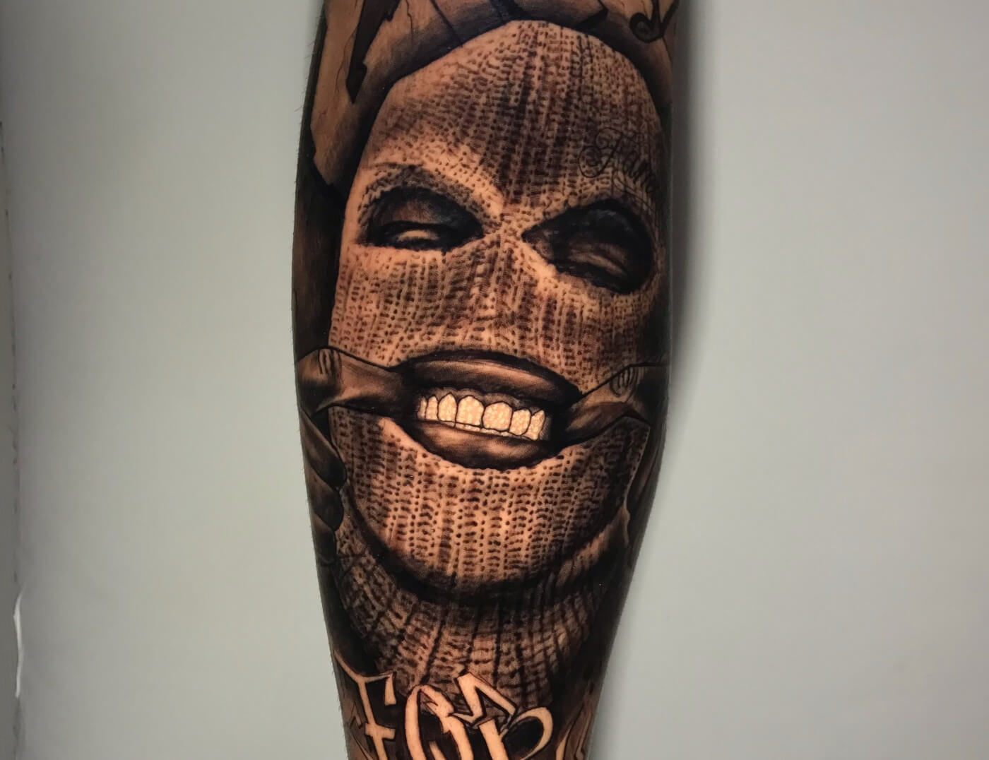 Ski Mask Black & Grey Photo Realism Tattoo by Rene Cristobal, a guest artist at Iron Palm Tattoos. Rene is a visiting artist from Vision Tattoo Studio in Concepcion, Chile. We're open late night until 2AM. Call 404-973-7828 or stop by for a free consultation.