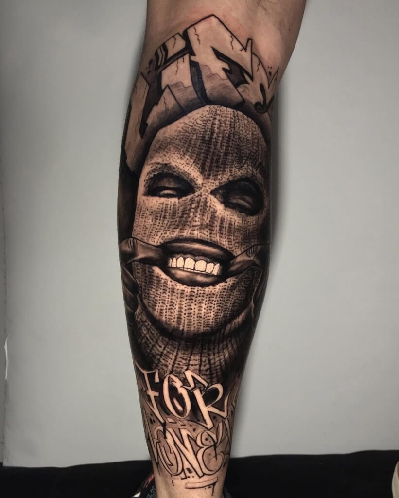 Ski Mask Black & Grey Photo Realism Tattoo by Rene Cristobal, a guest artist at Iron Palm Tattoos. Rene is a visiting artist from Vision Tattoo Studio in Concepcion, Chile. Rene is available for booking Sept 11th - 18th, 2023 at Iron Palm. We're open late night until 2AM. Call 404-973-7828 or stop by for a free consultation.