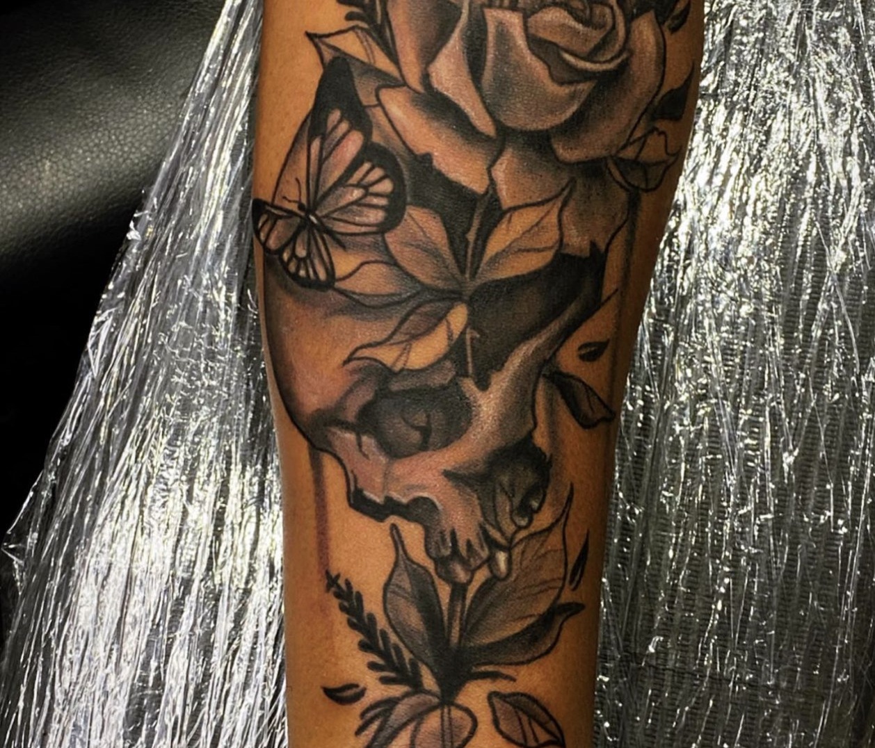 Butterfly And Rose Floral Tattoo By Khem At Iron Palm Tattoos in downtown Atlanta, GA. Call 404 -973-7828 or stop by for a free consultation with Khem. Walk Ins are welcome.