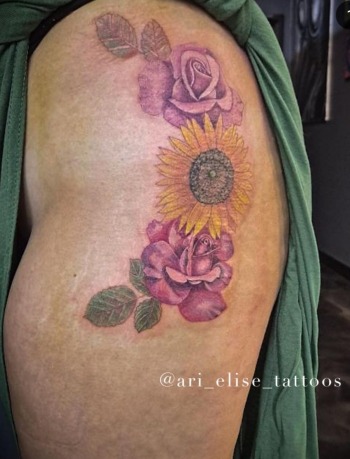 Sunflower & Rose Tattoo By Ari Elise, A Guest Tattoo Artist At Iron Palm Tattoos. This tattoo was done by Ari for her client Lynsie Hannon at Hart & Huntington Tattoo Company in Orlando, Florida. Ari is available for booking in August 2023. We're open late night until 2AM most nights. Call 404-973-7828 or stop by for a free consultation.