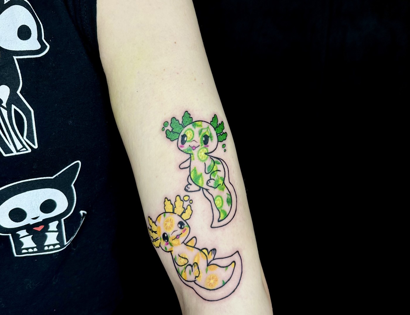 Axoioti Salamanders Animal Tattoo By Tattoo Artist Morana. Morana comes to us from Iron & Ink Tattoo Studio in Atlanta, Georgia. She is available for booking Sept 23rd - 27th. Call 404-973-7828 or stop by for a free consultation. Walk Ins are welcome.