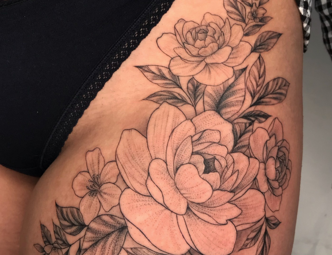 Lotus Flower Fine Line Blackwork Tattoo by Rene Cristobal, a guest artist at Iron Palm Tattoos. Lotus flowers are popular and aesthetic designs for women. Rene comes to us from Vision Tattoo Studio in Concepcion, Chile. He is available for booking Sept 11th, 2023. Call 404-973-7828 or stop by for a free consultation. Walk Ins are welcome.