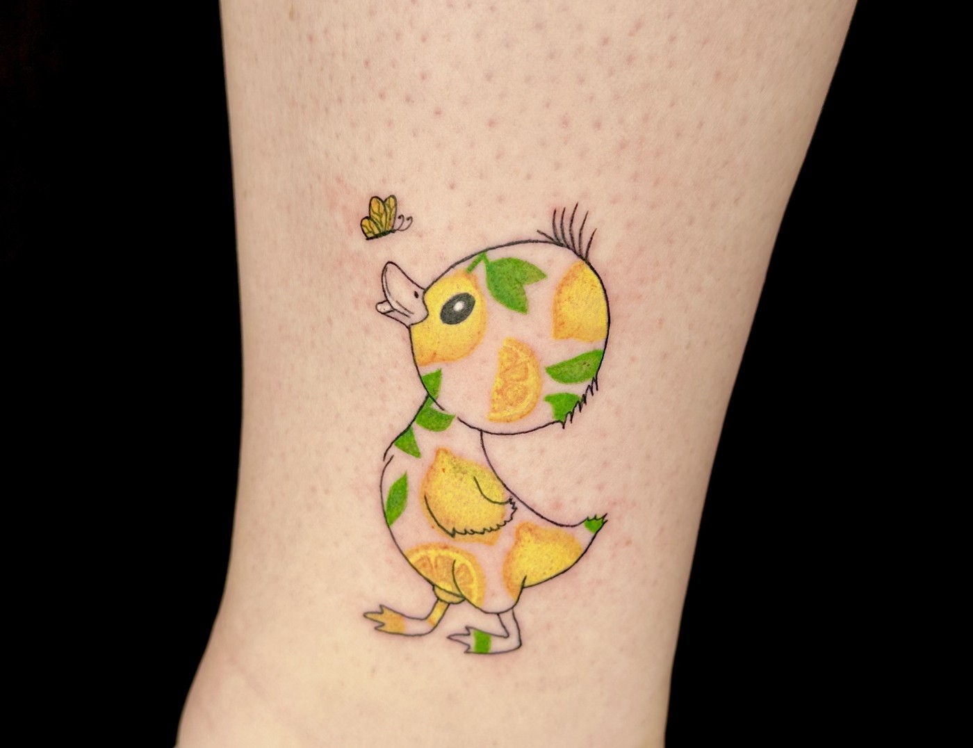 Duckling & Butterfly with Lemon Color Tattoo By Morana, a guest tattoo artist at Iron Palm Tattoos in Atlanta. Morana comes to us from Iron & Ink Tattoo Studio in Los Angeles and will be available for booking Sept 23 - 27th. We're open late night until 2AM most nights. Call 404-973-7828 or stop by for a free consultation.