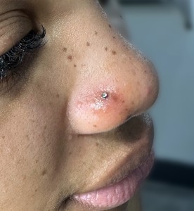 Nose Body Piercing By Khem At Iron Palm Tattoos. Khem is resident Iron Palm's master piercer. She is normally available in the evenings at Iron Palm. Nose piercings at Iron Palm include jewelry with the service. Call 404--973-7828 or stop by for a free consultation. Walk-ins are welcome.