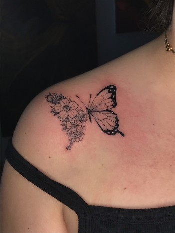'Butterfly Landing On Flowers' Fineline Blackwork Floral Insect Tattoo By Rene Cristobal, a tattoo artist at Iron Palm Tattoos & Body Piercing in downtown Atlanta, Georgia. We love the intricacy and detail conveyed in a minimalist way. Rene is a new tattoo artist at Iron Palm Tattoos from Concepcion, Chile. Call 404-973-7828 or stop by for a free consultation. Walk ins are welcome.