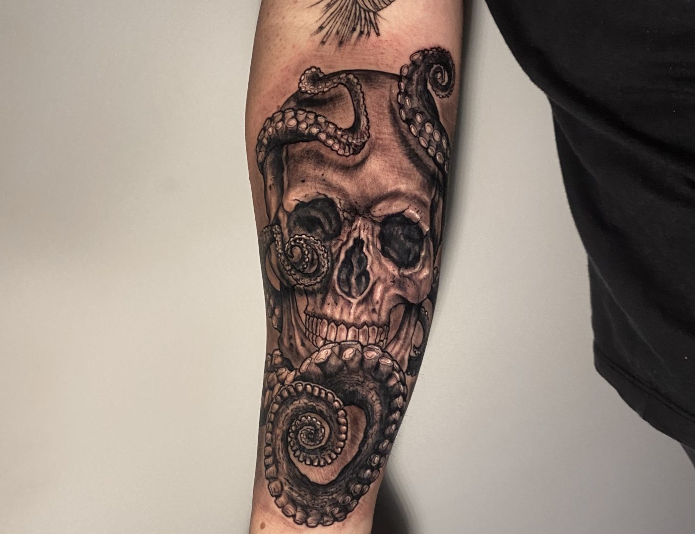 Skull And Octopus Surrealism Blackwork Tattoo By Rene Cristobal At Iron Palm Tattoos. Rene specializes in blackwork and black & gray tattoo but is experienced with many other styles. Call 404-973-7828 or stop by for a free consultation with Rene. Walk ins are welcome.