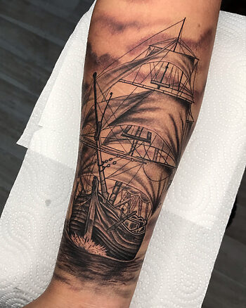 Ship Sailing At Sea Photo Realism Blackwork Tattoo By Rene Cristobal. Rene is a spanish speaking tattoo artist at Iron Palm Tattoos. Call 404-973-7828 or stop by for a free consultation with Rene. Walk Ins are welcome.