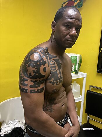 Tribal Tattoo By Binky Warbucks at Iron Palm Tattoos. African warrior tattoos symbolize bravery, fearlessness, resilience, and strength. For expatriate Nigerians in modern times they' also represent a sense of connection to ancestry. Iron Palm Tattoos is a multi-style tattoo shop in Atlanta, GA