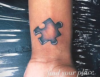 Puzzle Pierce Tattoo By Binky Warbucks At Iron Palm Tattoos thumbnail 1