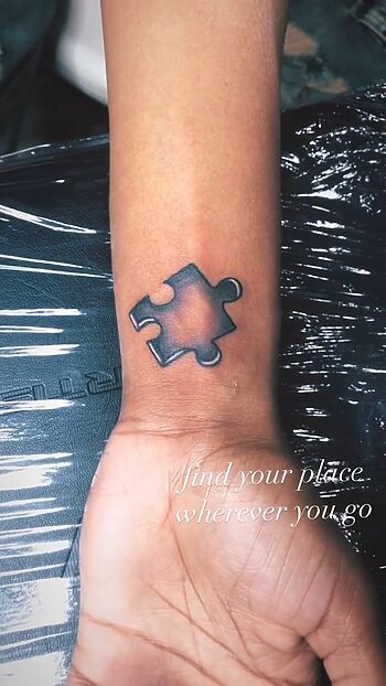 Puzzle Pierce Tattoo By Binky Warbucks At Iron Palm Tattoos thumbnail 1