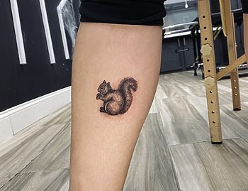 Squirrel Blackwork Animal Tattoo By Rene Cristobal at Iron Palm Tattoos in south downtown Atlanta, GA. Squirrels typically represent fun, comedy, or entertainment. (She's squirrely). Call 404-973-7828 or stop by for a free consultation. Walk ins are welcome.