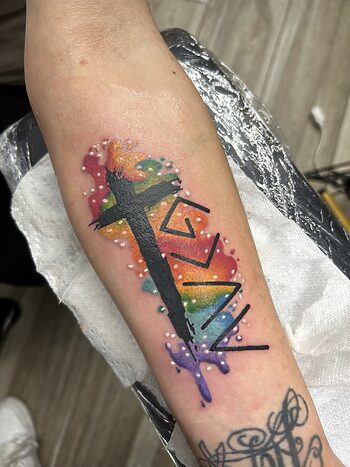 Christian Cross & Waterfall Watercolor Tattoo By Lyric TheArtist at Iron Palm Tattoos In downtown Atlanta, GA. This customer was recently baptized and wanted to commemorate the occasion with a permanent visual reminder. We wish her well on her new journey. Iron Palm is Atlanta's only late night tattoo shop. Call 404-973-7828 or stop by for a free consultation with a body artist. Walk ins are always welcome.